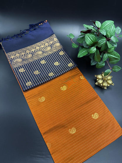 Rustic Orange Dupion Silk Saree and Navy Blue Border with Mango buttas