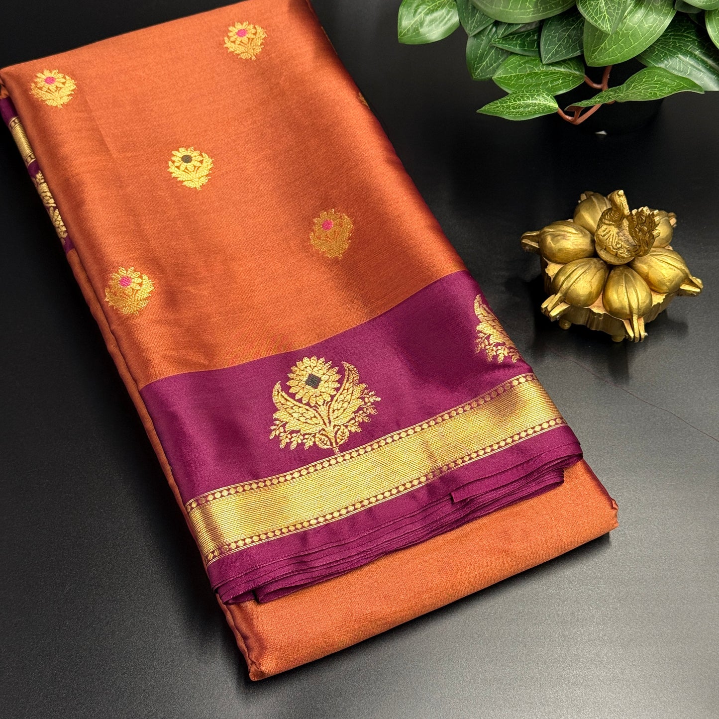 Rustic Orange Blended Silk Saree Adorned with a Maroon and Gold Zari Border